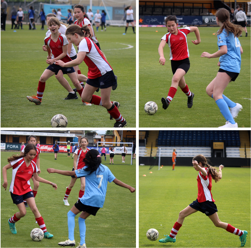 girls playing football at a competition