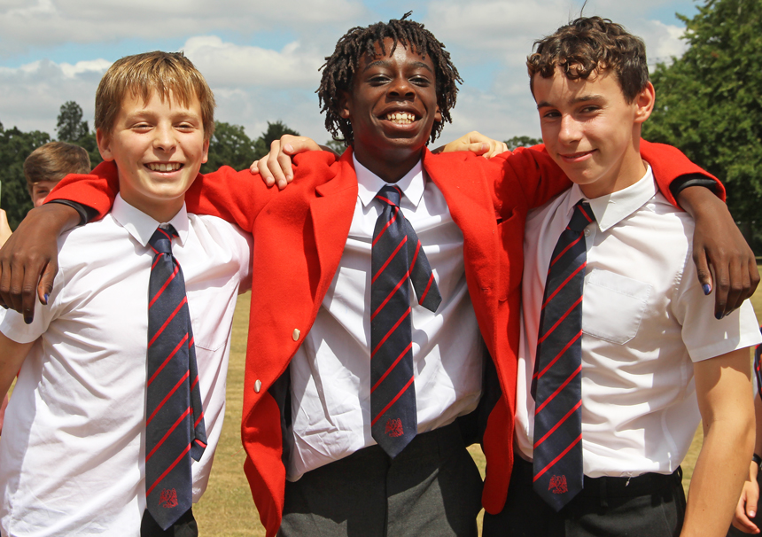 boys smiling at the camera