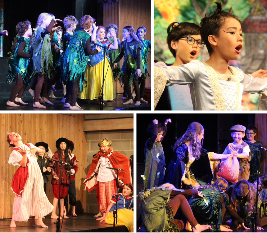 children acting on a stage in costumes