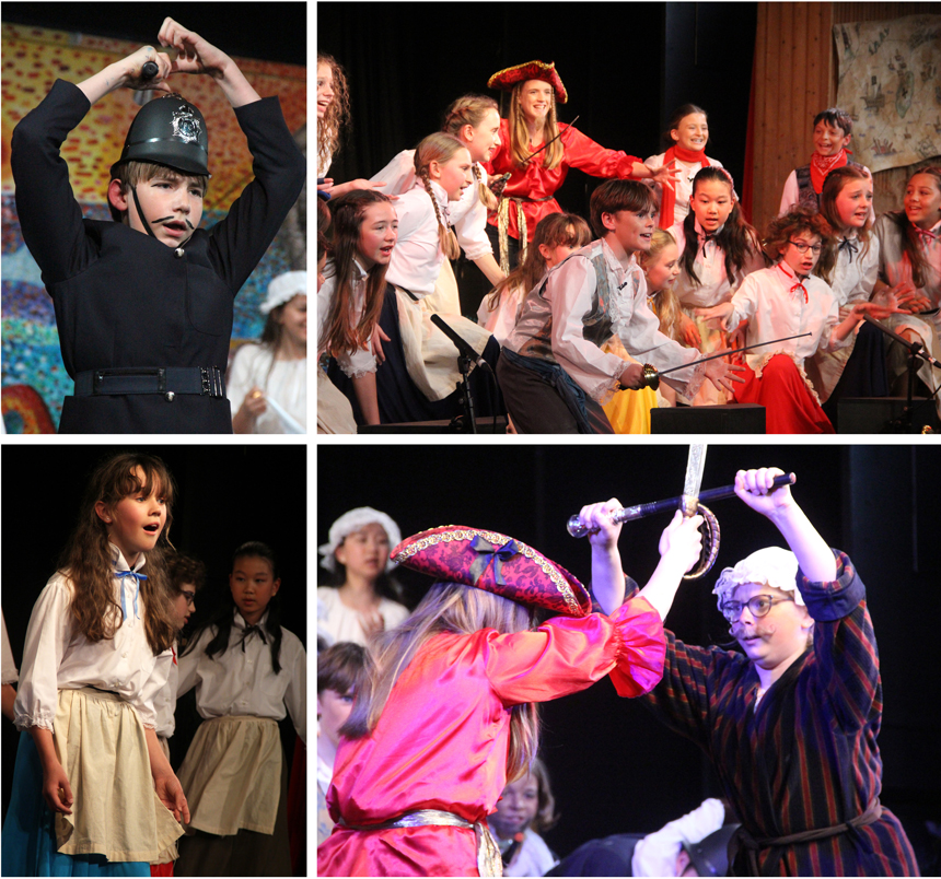 children dressed in pirates costumes acting on stage