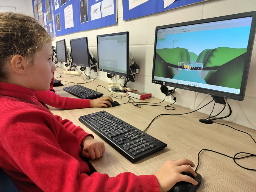 child looking at a computer