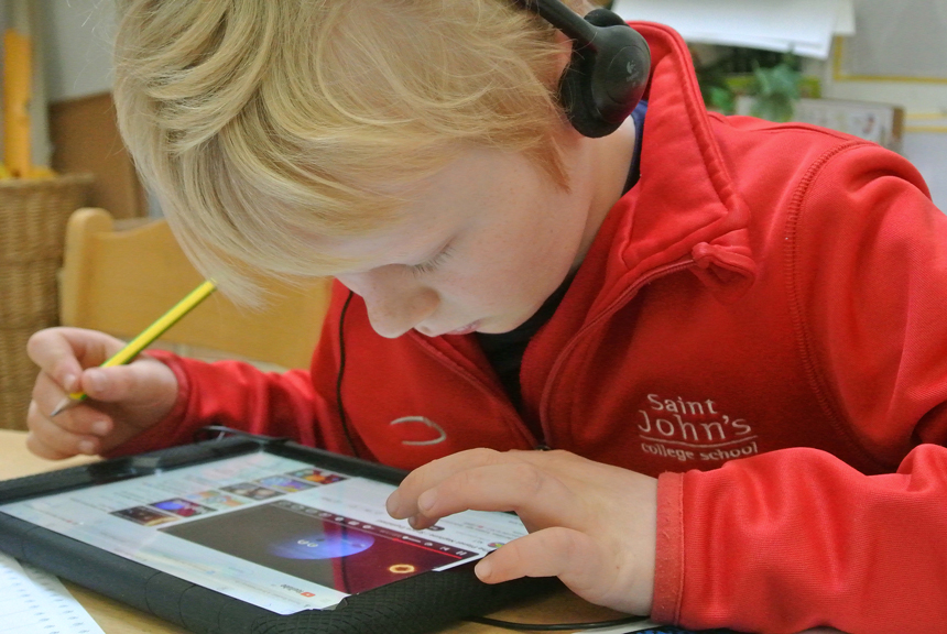 child using an ipad