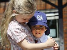 Two pupils smiling