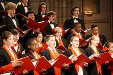 choristers singing in a choir in a church