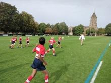 Boys playing rugby