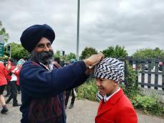pupil outside a gurdwara