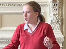 girl speaking at a debating competition