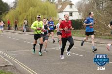 man running in a half marathon