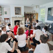 children listening to an artist talk in kettle's yard museum