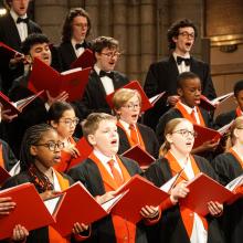 choristers singing in a choir in a church