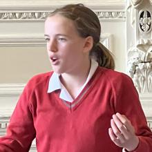 girl speaking at a debating competition