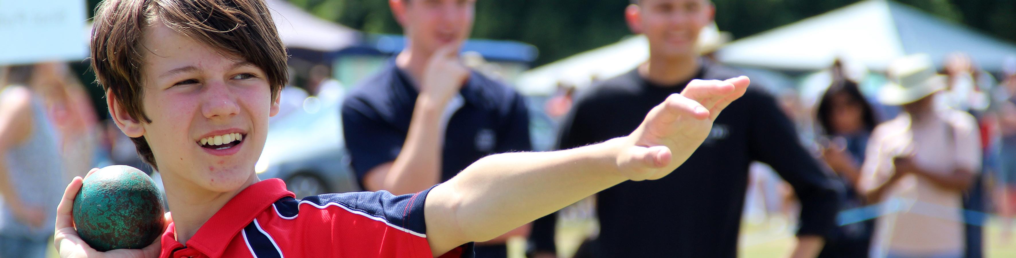 boy getting ready to through shotput